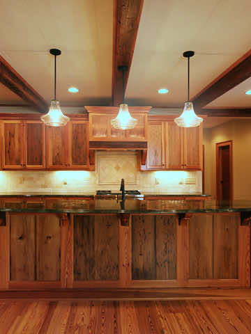 reclaimed heart pine flooring in a kitchen and family room