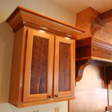 Custom Heart Pine Cabinets with a Copper Hood Vent